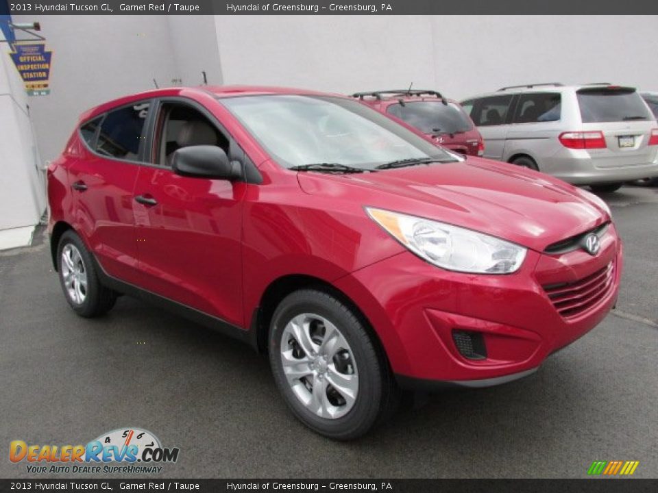 Front 3/4 View of 2013 Hyundai Tucson GL Photo #3
