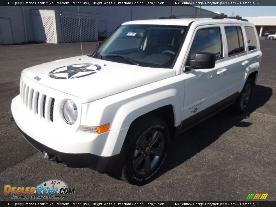 Front 3/4 View of 2013 Jeep Patriot Oscar Mike Freedom Edition 4x4 Photo #2