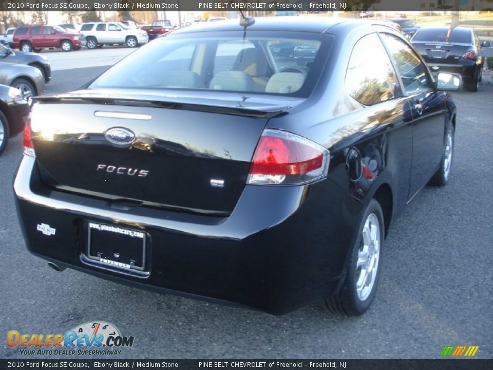 2010 Ford Focus SE Coupe Ebony Black / Medium Stone Photo #7