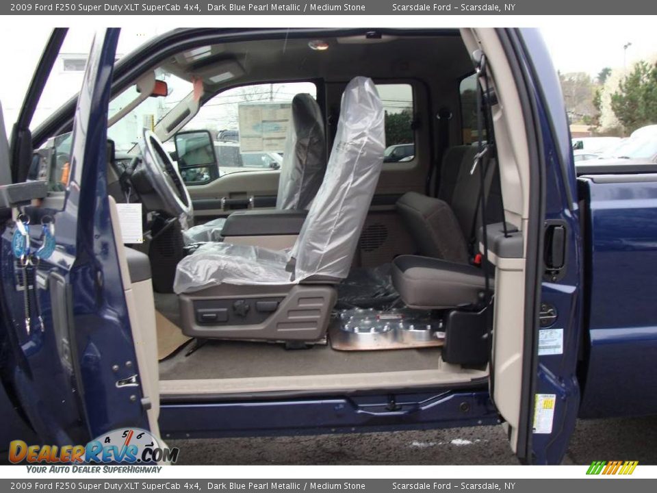 2009 Ford F250 Super Duty XLT SuperCab 4x4 Dark Blue Pearl Metallic / Medium Stone Photo #17
