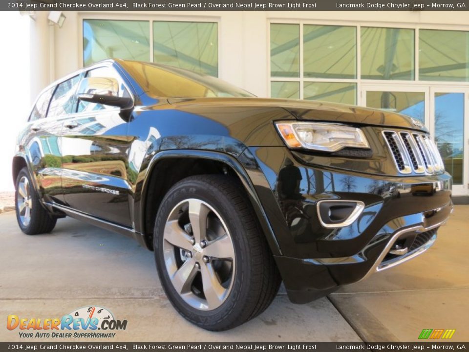 Front 3/4 View of 2014 Jeep Grand Cherokee Overland 4x4 Photo #4