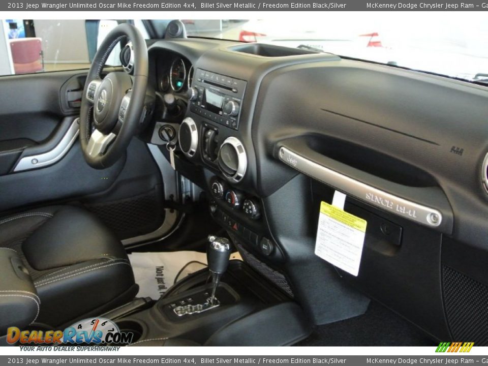 Dashboard of 2013 Jeep Wrangler Unlimited Oscar Mike Freedom Edition 4x4 Photo #21