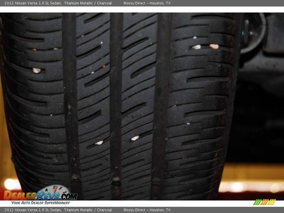 2012 Nissan Versa 1.6 SL Sedan Titanium Metallic / Charcoal Photo #7