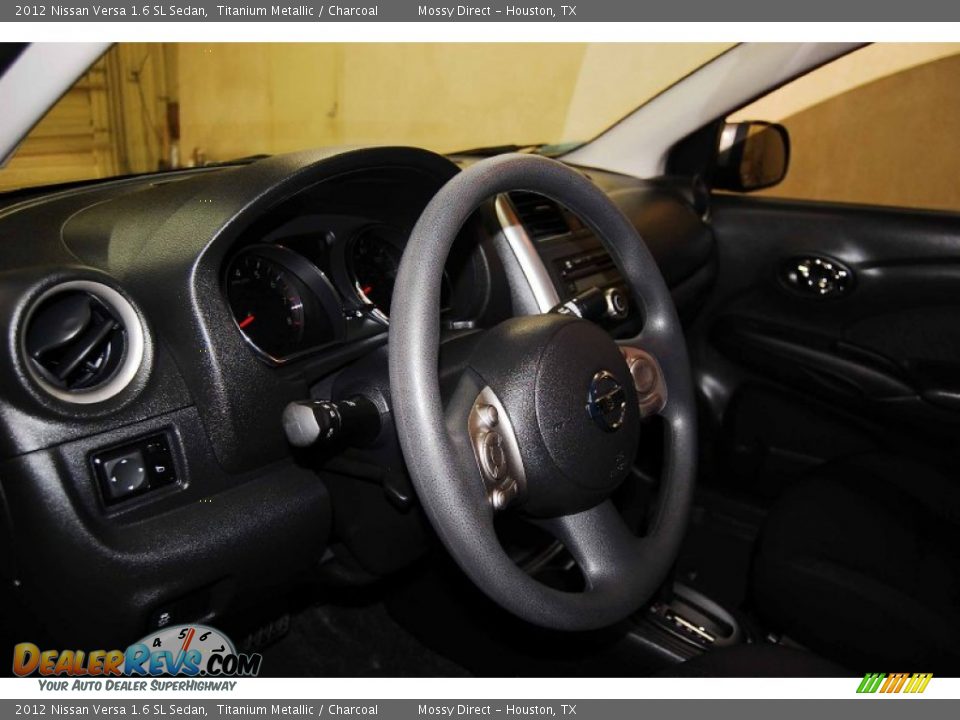 2012 Nissan Versa 1.6 SL Sedan Titanium Metallic / Charcoal Photo #11