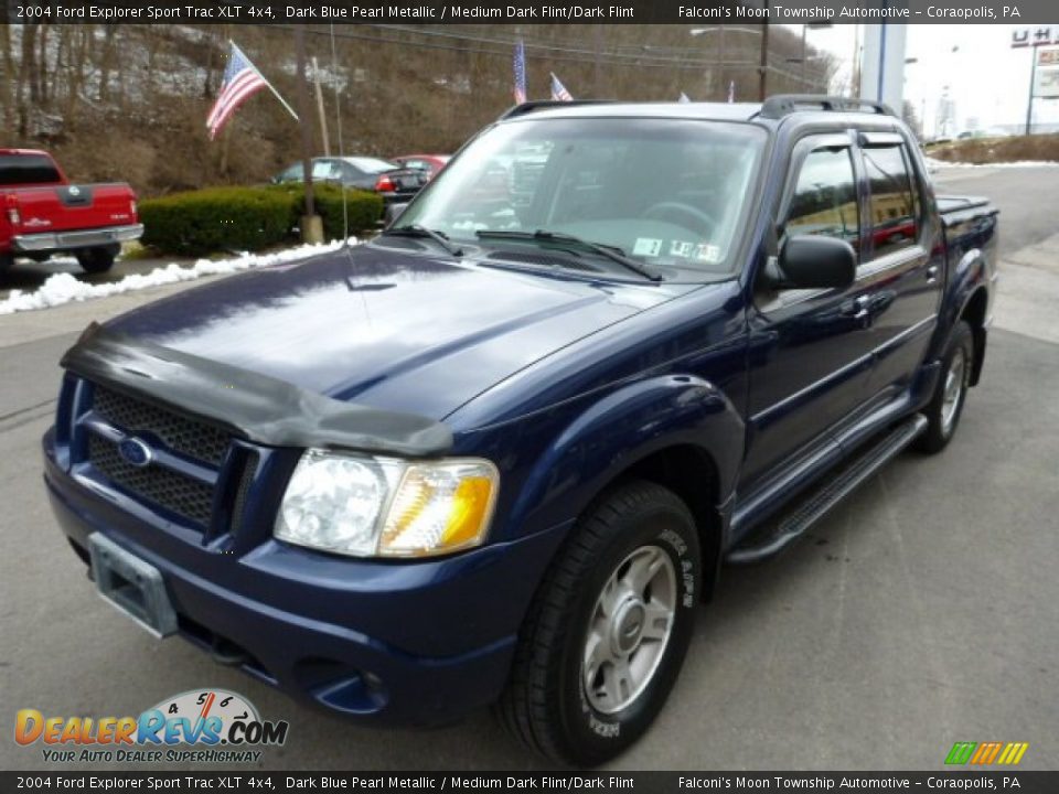Front 3/4 View of 2004 Ford Explorer Sport Trac XLT 4x4 Photo #6