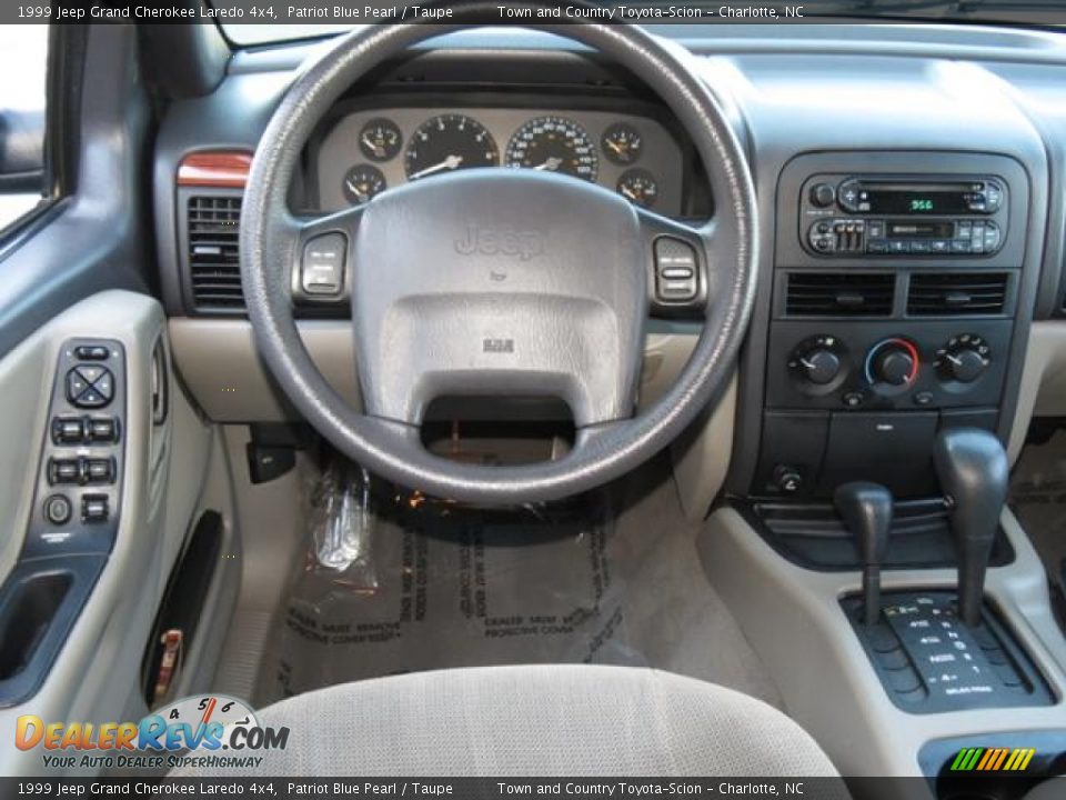 1999 Jeep Grand Cherokee Laredo 4x4 Patriot Blue Pearl / Taupe Photo #5