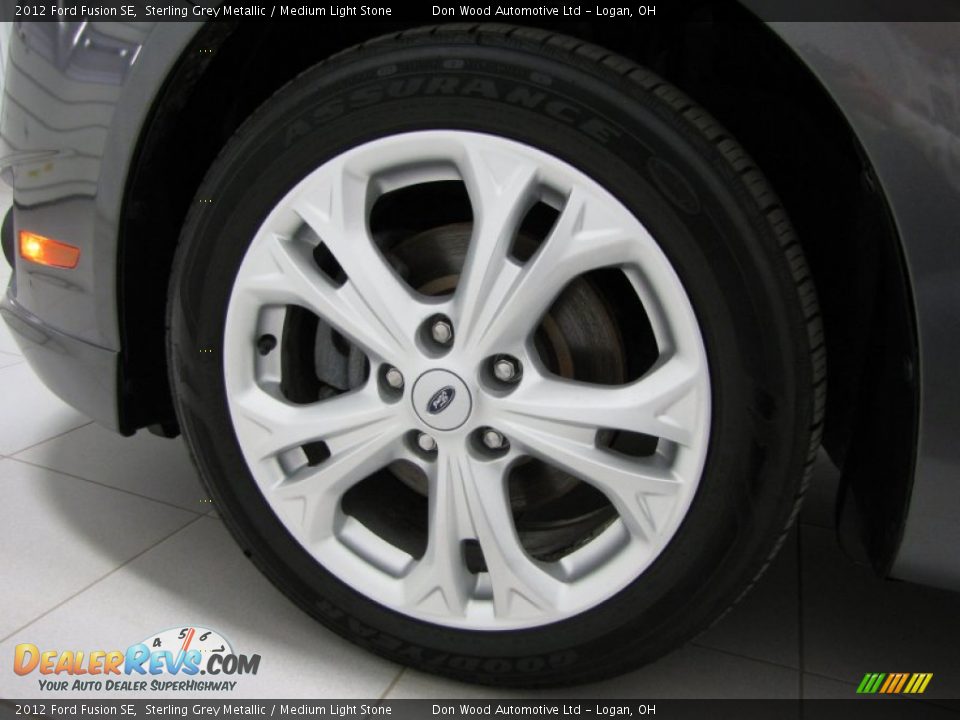 2012 Ford Fusion SE Sterling Grey Metallic / Medium Light Stone Photo #25