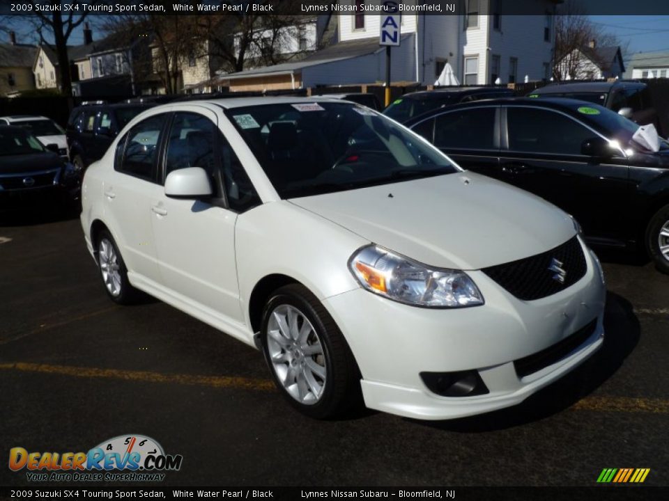 2009 Suzuki SX4 Touring Sport Sedan White Water Pearl / Black Photo #1