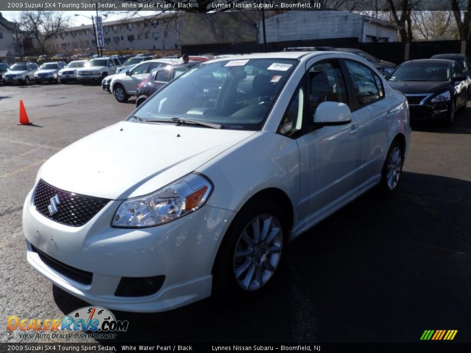 2009 Suzuki SX4 Touring Sport Sedan White Water Pearl / Black Photo #3