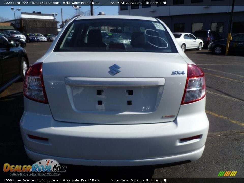 2009 Suzuki SX4 Touring Sport Sedan White Water Pearl / Black Photo #4