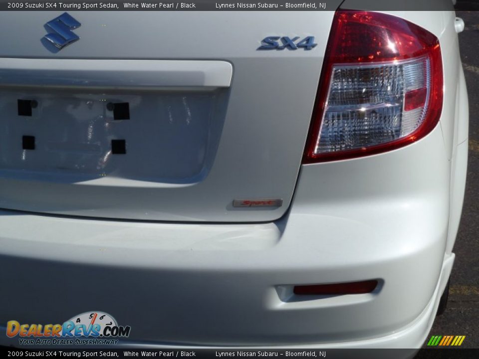 2009 Suzuki SX4 Touring Sport Sedan White Water Pearl / Black Photo #5