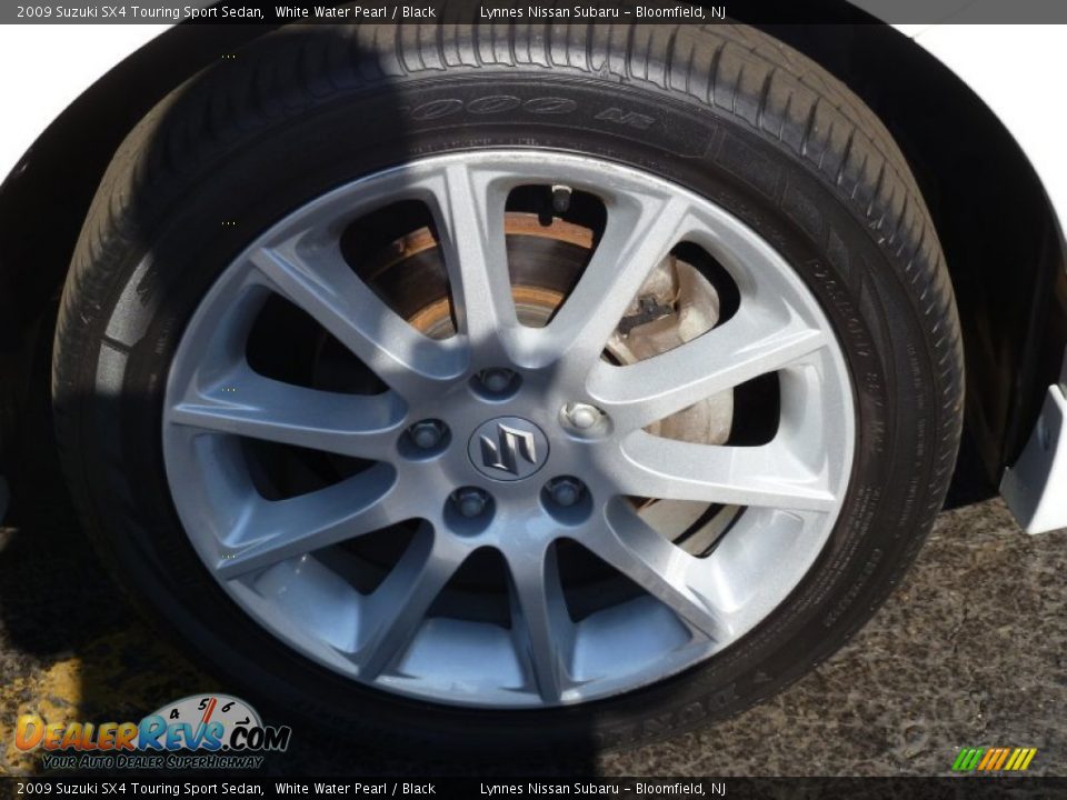 2009 Suzuki SX4 Touring Sport Sedan White Water Pearl / Black Photo #9