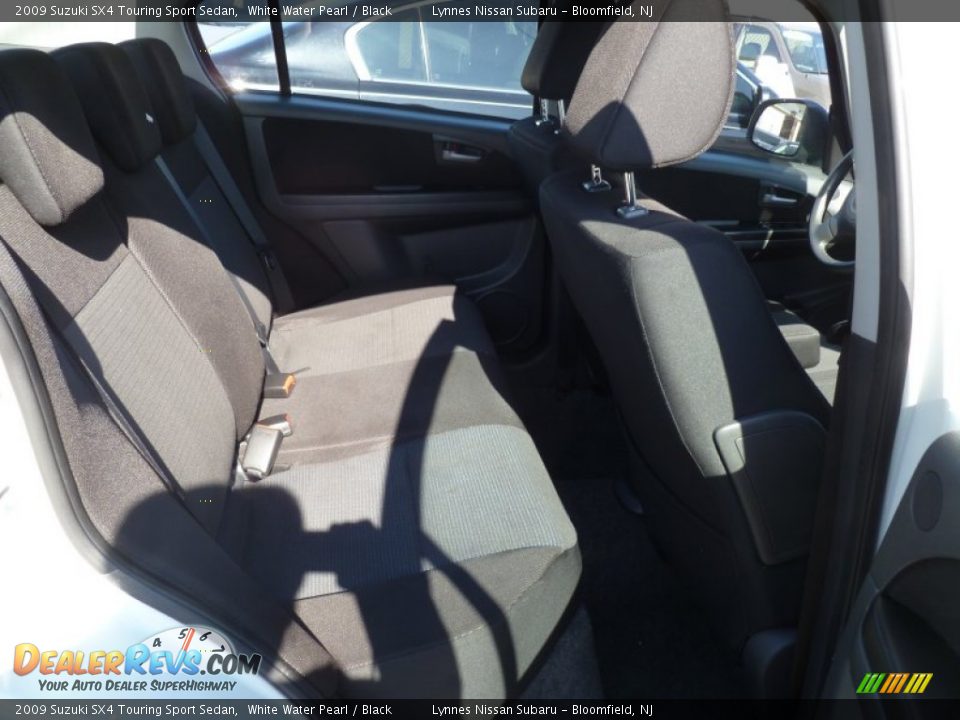 2009 Suzuki SX4 Touring Sport Sedan White Water Pearl / Black Photo #11