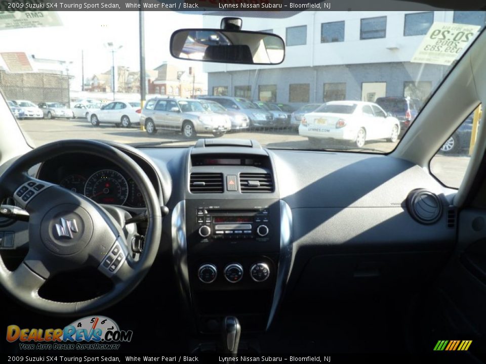 2009 Suzuki SX4 Touring Sport Sedan White Water Pearl / Black Photo #15