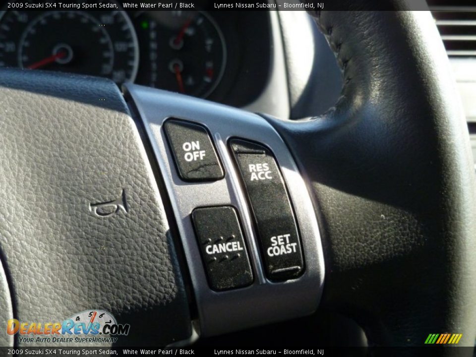 2009 Suzuki SX4 Touring Sport Sedan White Water Pearl / Black Photo #17