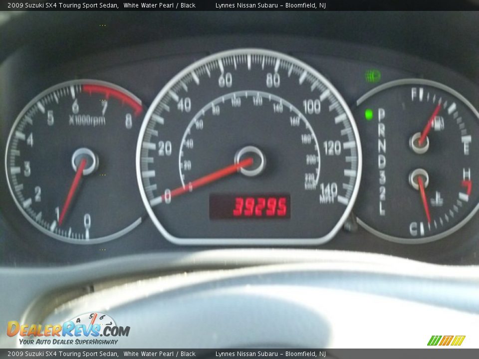 2009 Suzuki SX4 Touring Sport Sedan White Water Pearl / Black Photo #19