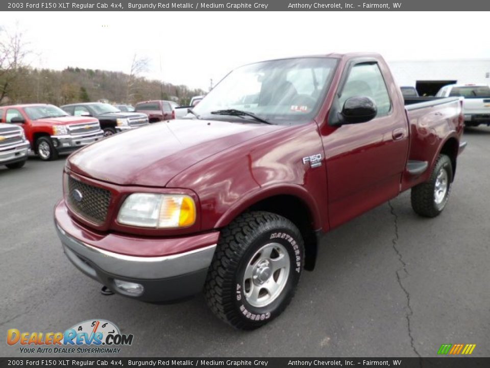 Front 3/4 View of 2003 Ford F150 XLT Regular Cab 4x4 Photo #3