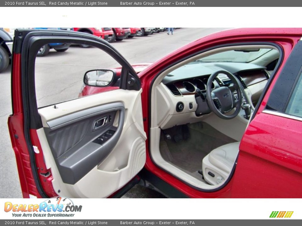 2010 Ford Taurus SEL Red Candy Metallic / Light Stone Photo #11