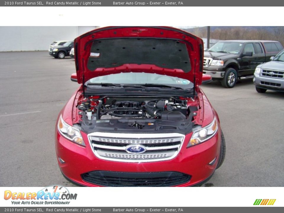 2010 Ford Taurus SEL Red Candy Metallic / Light Stone Photo #18