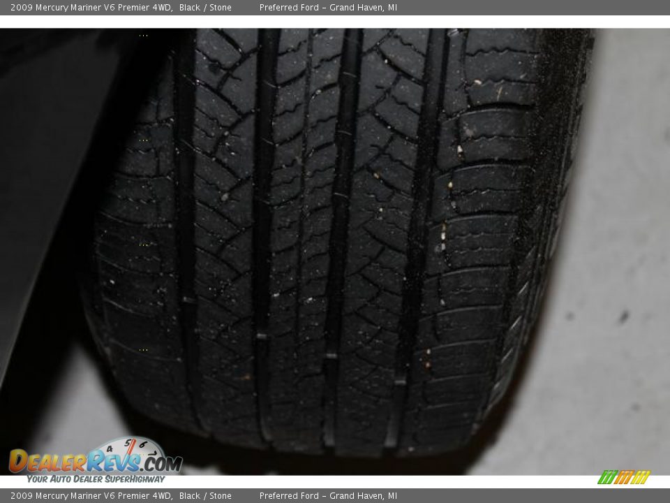 2009 Mercury Mariner V6 Premier 4WD Black / Stone Photo #11