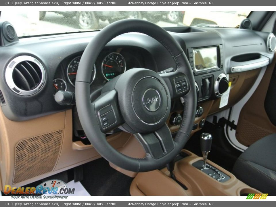 Dashboard of 2013 Jeep Wrangler Sahara 4x4 Photo #24
