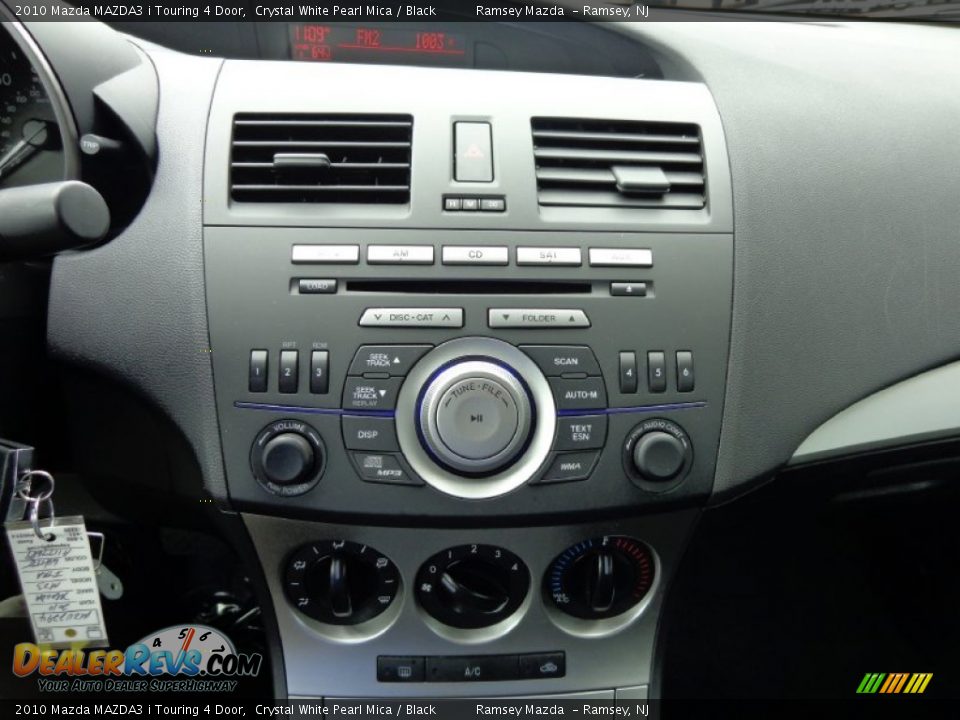 2010 Mazda MAZDA3 i Touring 4 Door Crystal White Pearl Mica / Black Photo #26