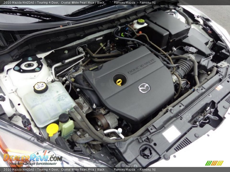 2010 Mazda MAZDA3 i Touring 4 Door Crystal White Pearl Mica / Black Photo #35