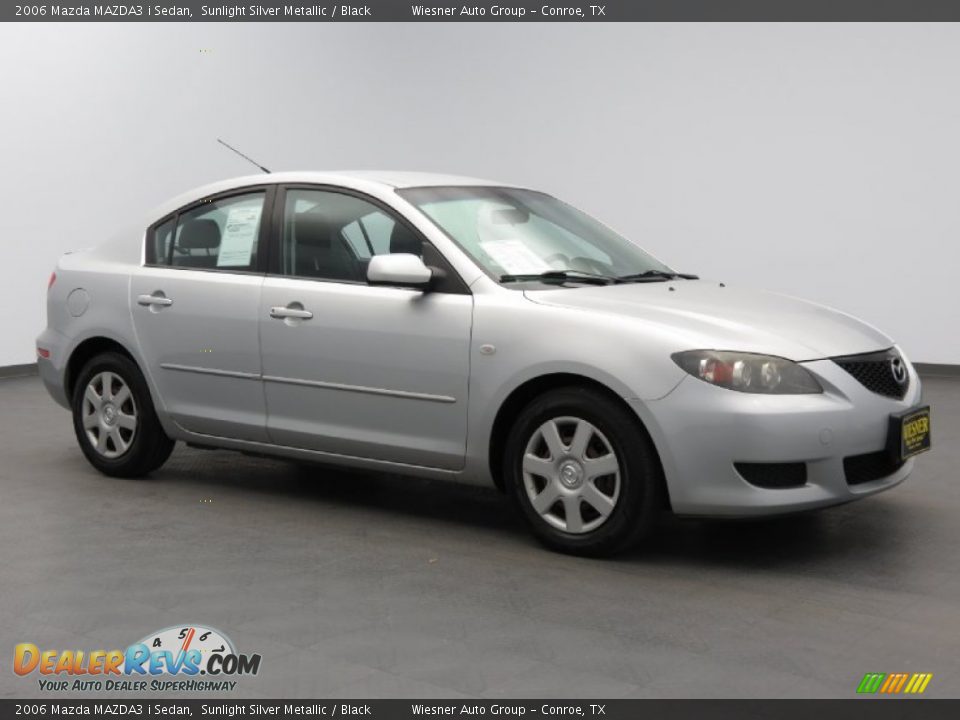 2006 Mazda MAZDA3 i Sedan Sunlight Silver Metallic / Black Photo #2