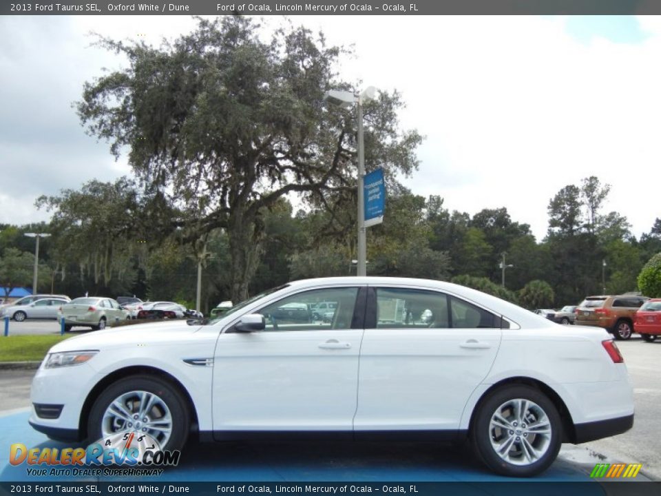 2013 Ford Taurus SEL Oxford White / Dune Photo #2
