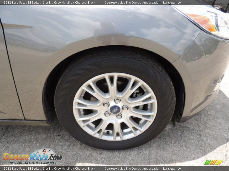 2012 Ford Focus SE Sedan Sterling Grey Metallic / Charcoal Black Photo #23