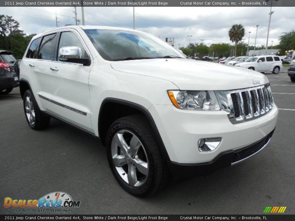 Front 3/4 View of 2011 Jeep Grand Cherokee Overland 4x4 Photo #11