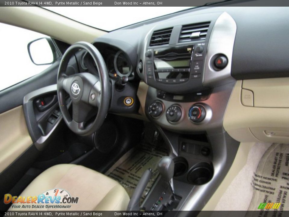 2010 Toyota RAV4 I4 4WD Pyrite Metallic / Sand Beige Photo #21