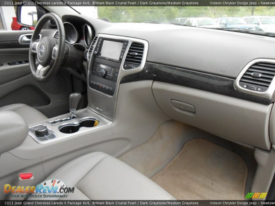 Dashboard of 2011 Jeep Grand Cherokee Laredo X Package 4x4 Photo #5
