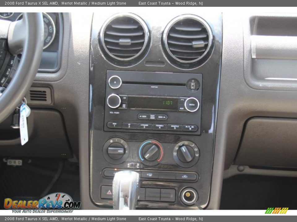 2008 Ford Taurus X SEL AWD Merlot Metallic / Medium Light Stone Photo #10