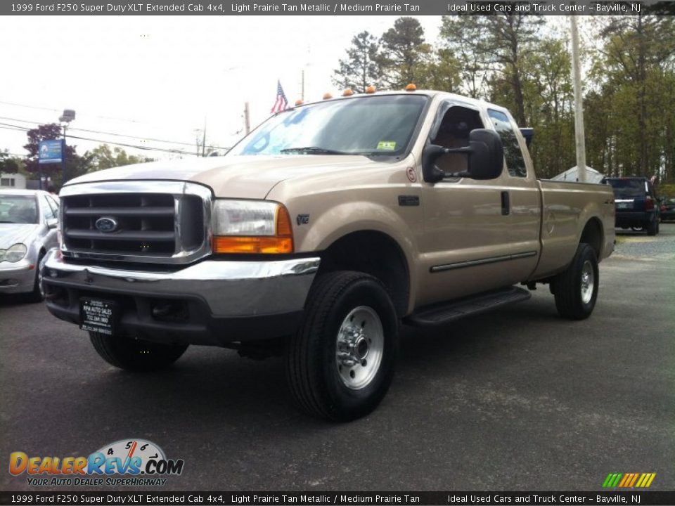 1999 Ford F250 Super Duty XLT Extended Cab 4x4 Light Prairie Tan Metallic / Medium Prairie Tan Photo #1