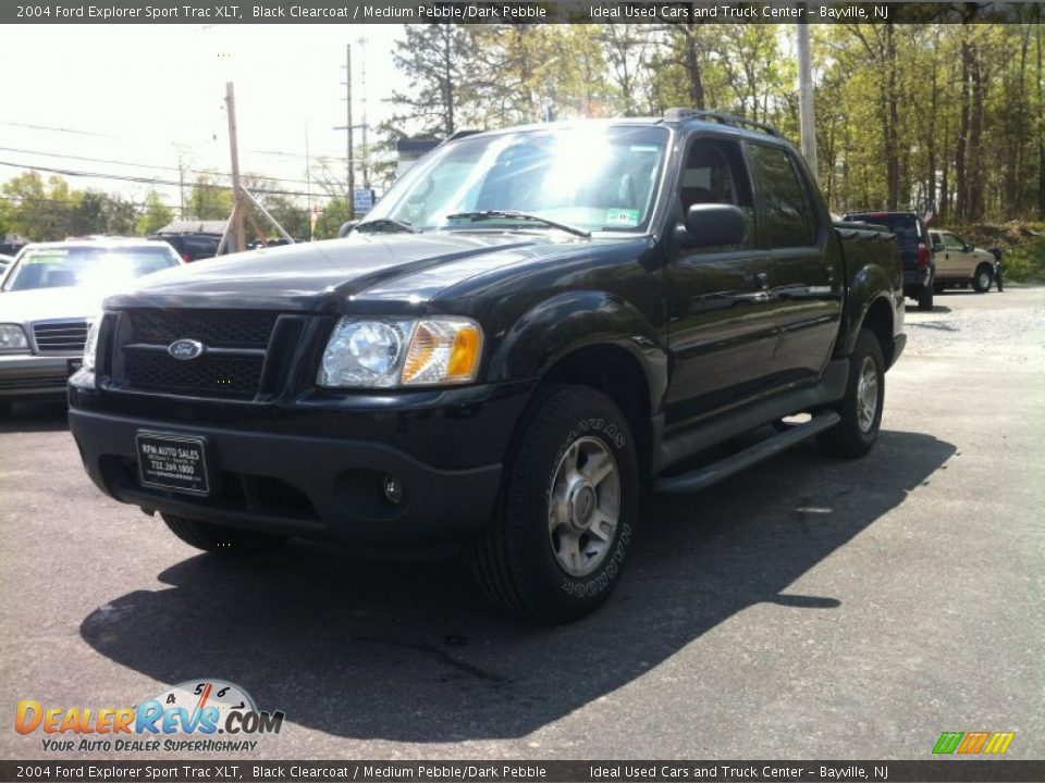 2004 Ford Explorer Sport Trac XLT Black Clearcoat / Medium Pebble/Dark Pebble Photo #1