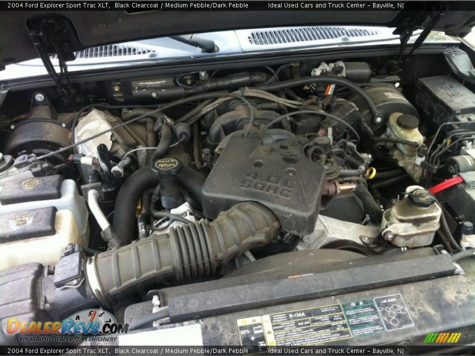 2004 Ford Explorer Sport Trac XLT Black Clearcoat / Medium Pebble/Dark Pebble Photo #24