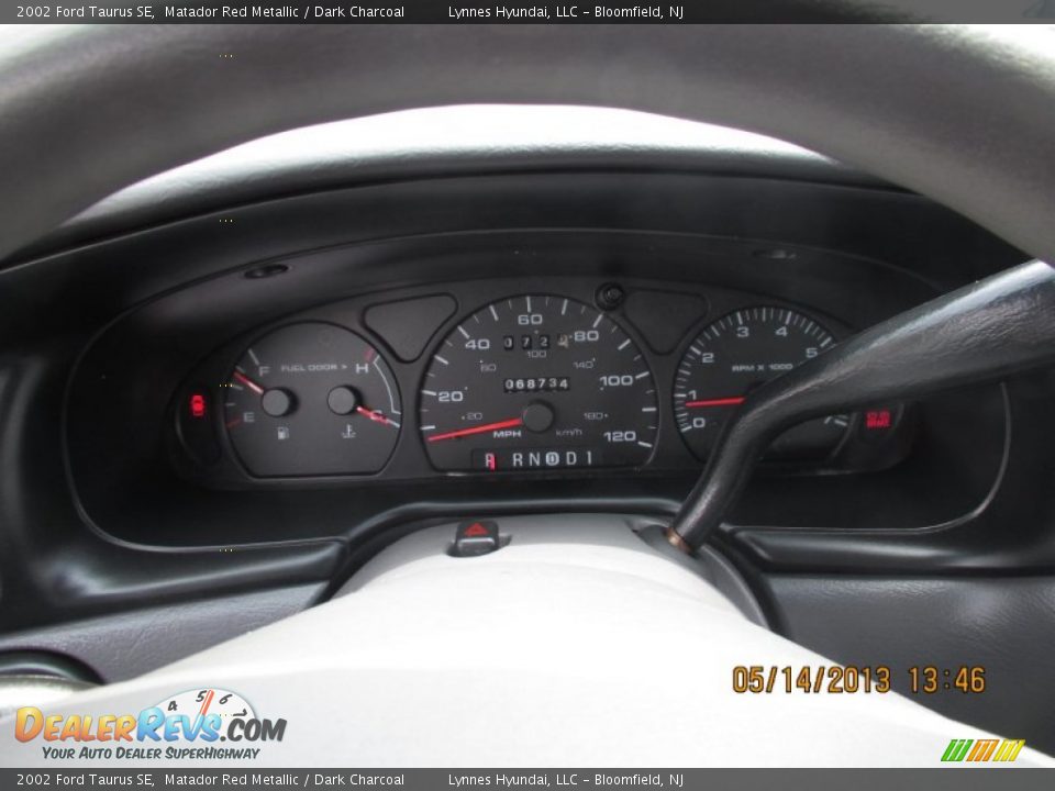 2002 Ford Taurus SE Matador Red Metallic / Dark Charcoal Photo #11