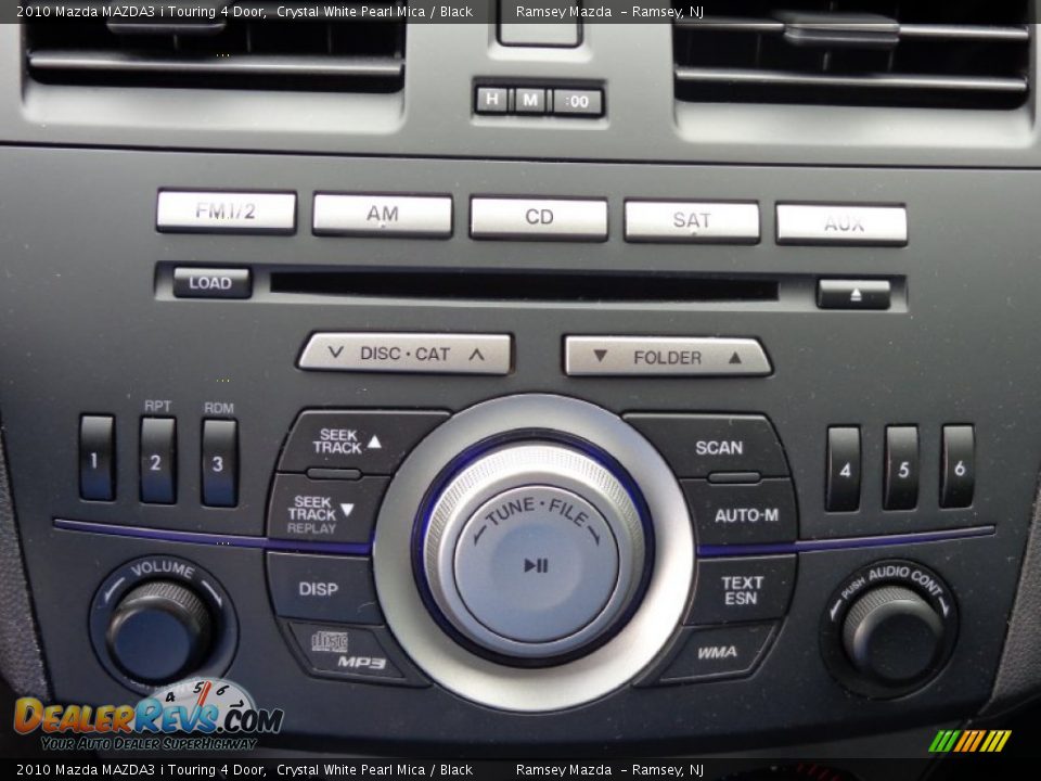 2010 Mazda MAZDA3 i Touring 4 Door Crystal White Pearl Mica / Black Photo #27