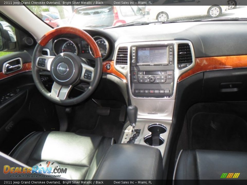 Dashboard of 2011 Jeep Grand Cherokee Overland Photo #12
