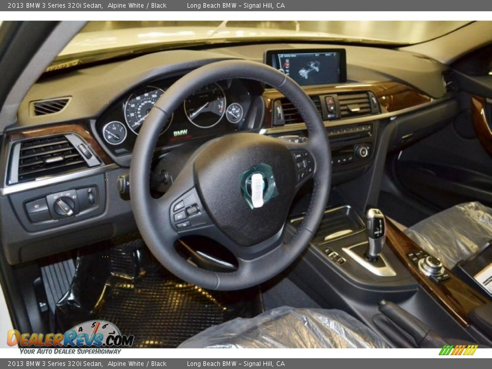 Dashboard of 2013 BMW 3 Series 320i Sedan Photo #6