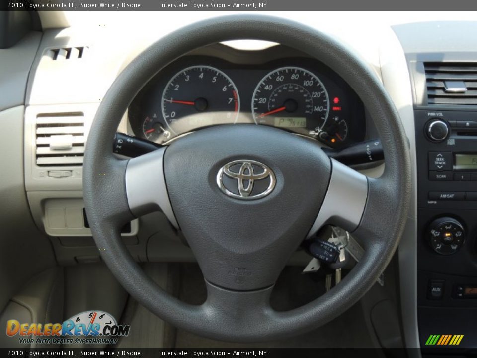 2010 Toyota Corolla LE Super White / Bisque Photo #11