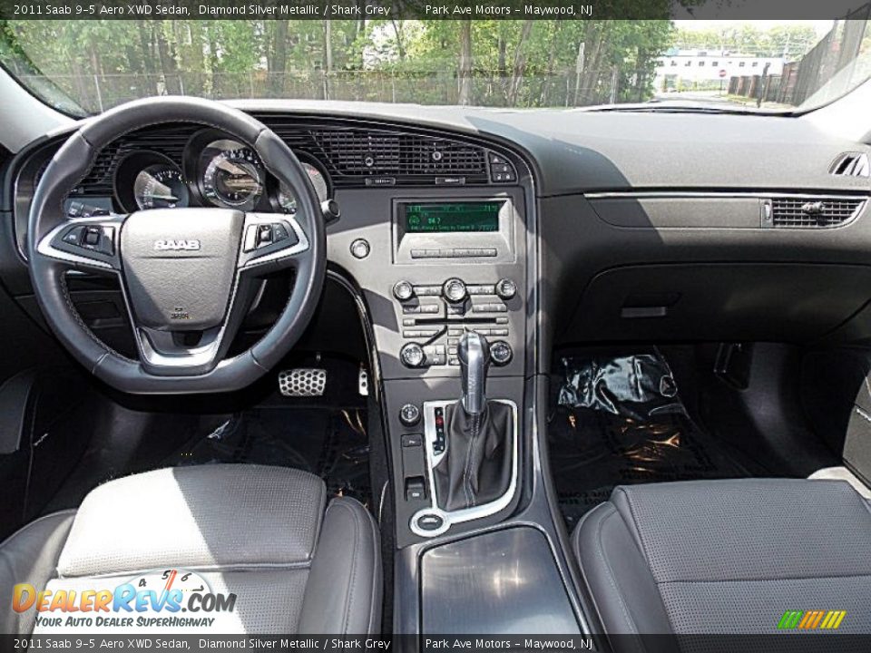 Dashboard of 2011 Saab 9-5 Aero XWD Sedan Photo #13