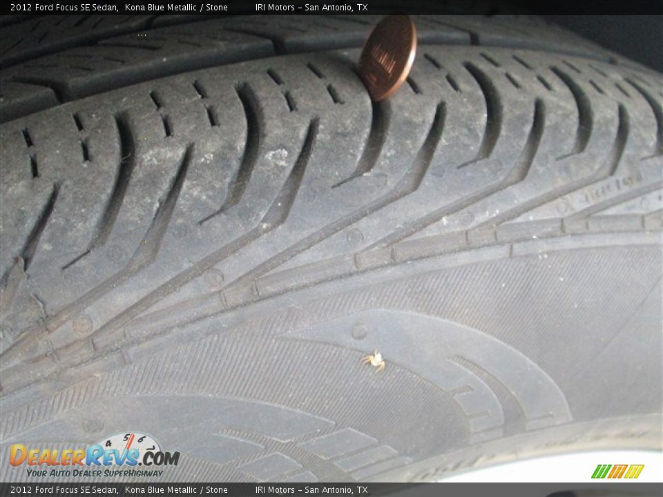 2012 Ford Focus SE Sedan Kona Blue Metallic / Stone Photo #7