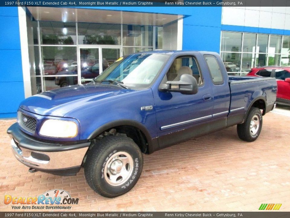 Front 3/4 View of 1997 Ford F150 XLT Extended Cab 4x4 Photo #10
