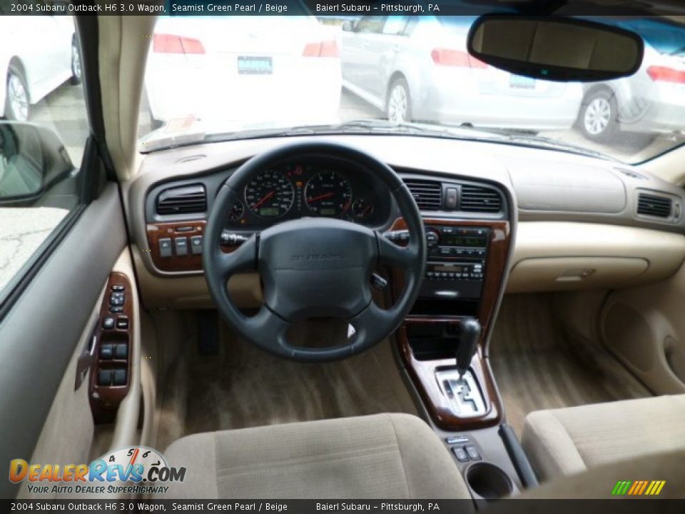 Dashboard of 2004 Subaru Outback H6 3.0 Wagon Photo #15