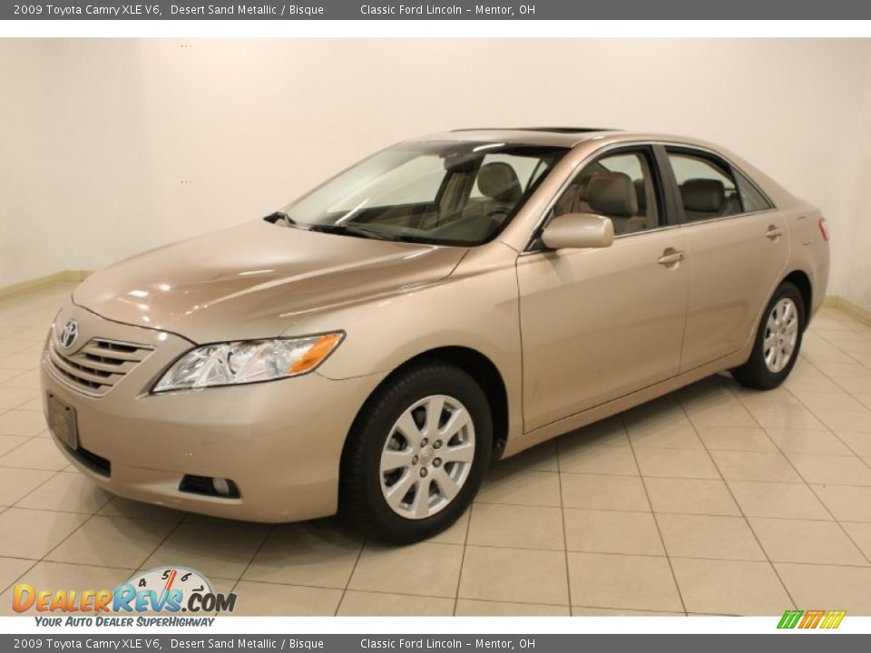 Front 3/4 View of 2009 Toyota Camry XLE V6 Photo #3