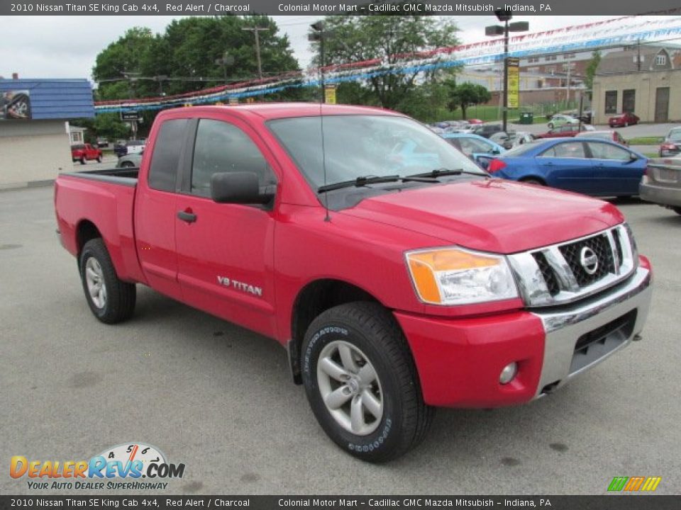 Front 3/4 View of 2010 Nissan Titan SE King Cab 4x4 Photo #5