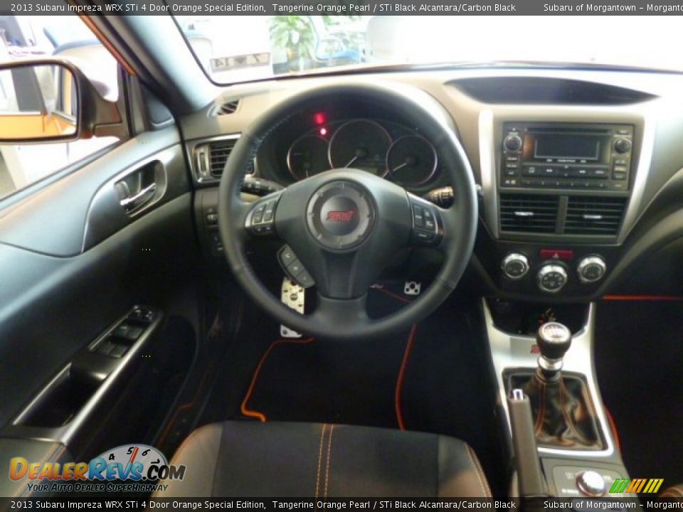 Dashboard of 2013 Subaru Impreza WRX STi 4 Door Orange Special Edition Photo #13