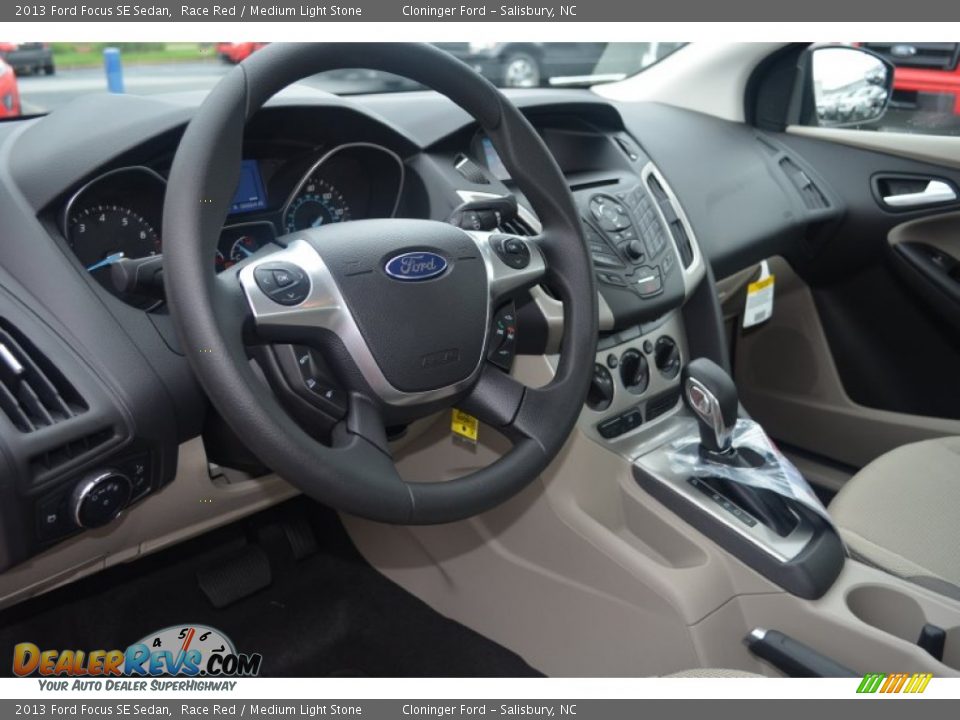 2013 Ford Focus SE Sedan Race Red / Medium Light Stone Photo #6